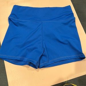Medium blue volleyball / workout shorts with ruched bottom